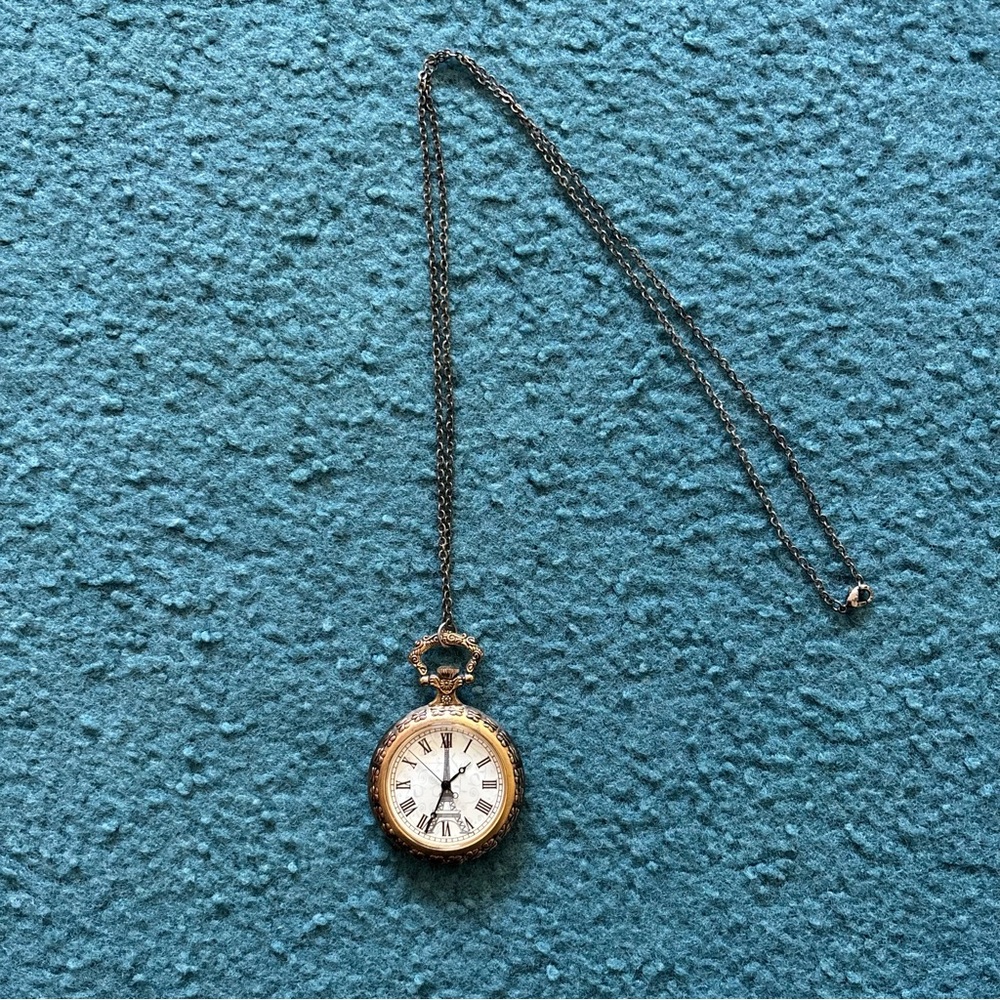 Gold Pocket Watch Necklace Featuring Eiffel Tower